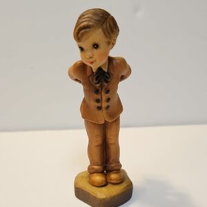 Vintage Style Boy Figurine in Warm Brown Tones